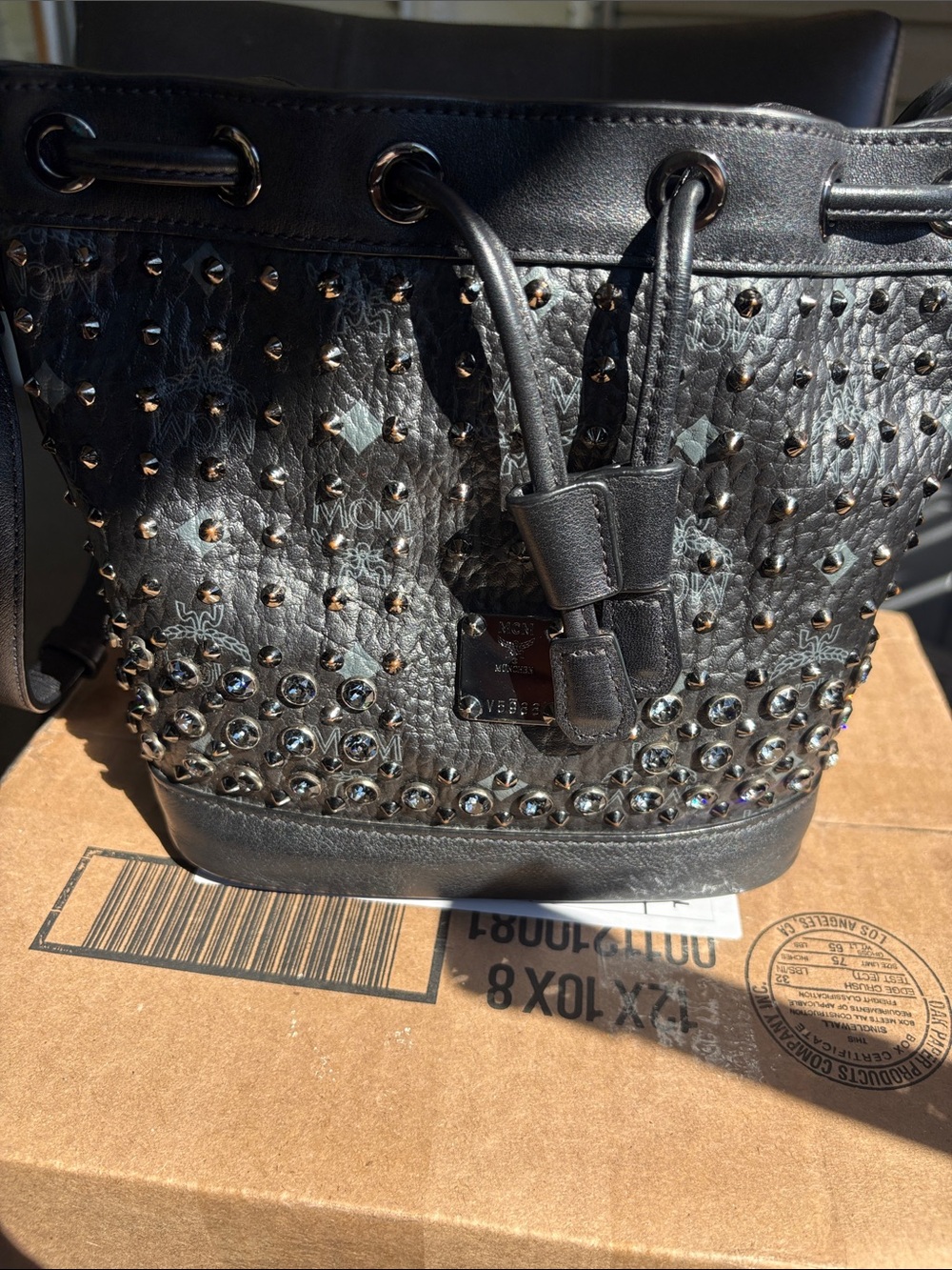 MCM Black Studded Leather Drawstring Bucket Bag with Silver Accents